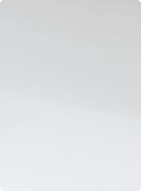 A smooth gradient of light gray to white.