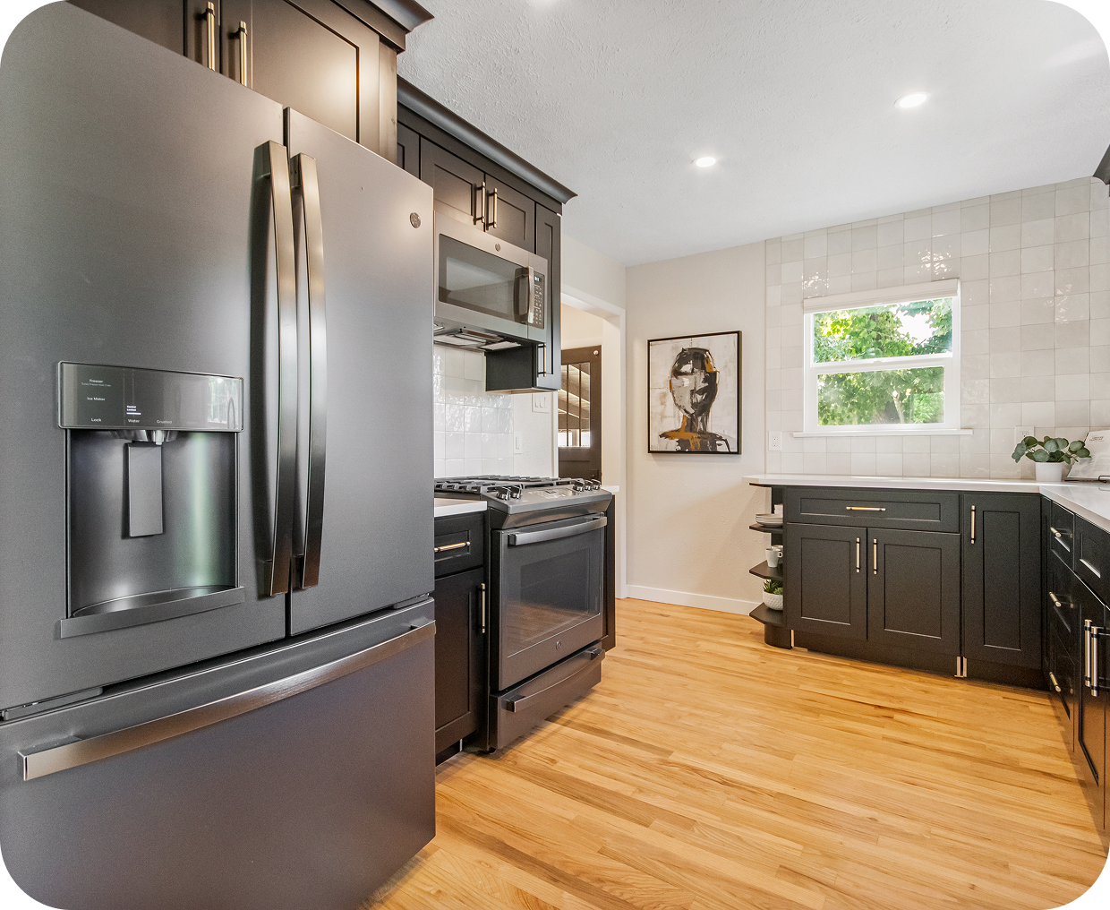 Modern kitchen with black appliances